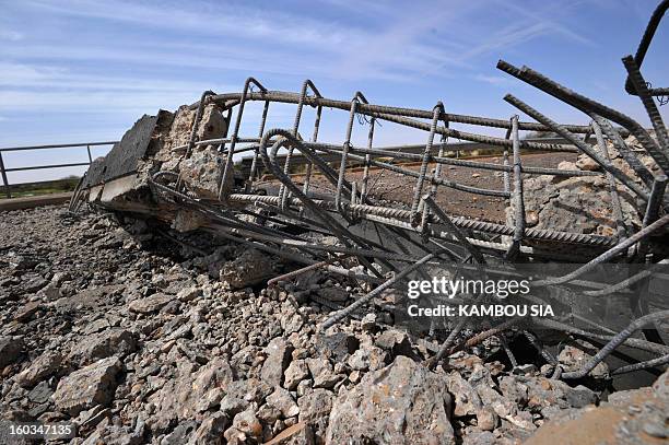 View of a bridge blown up by the Movement for Jihad and Oneness near Ansongo, a town south of the northern Malian city of Gao on January 29, 2013....