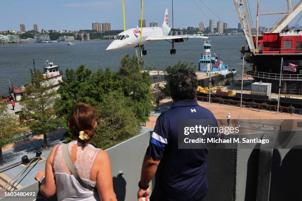 The British Airways Concorde is seen lifted by a crane at the Intrepid Museum on August 09, 2023 in New York City. The British Airways Concorde, the...