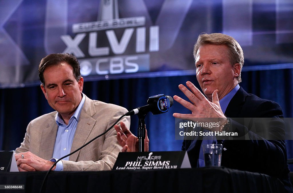 Sports announcers Jim Nantz and Phil Simms speak with the media at a