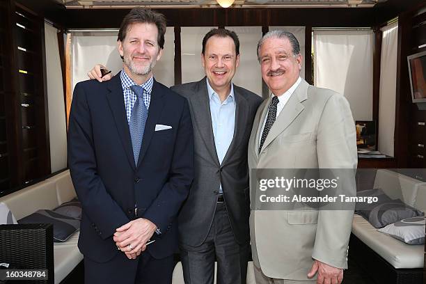 Barry Chamberlain, Armando Nunez and Joe Lucas are seen at the CBS Television Distribution cabana during NATPE at Fontainebleau Miami Beach on...