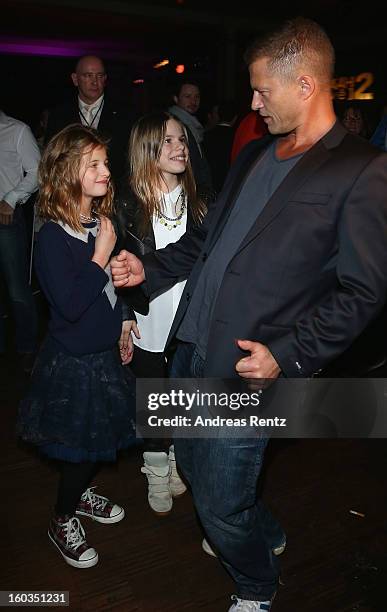 Til Schweiger dances with his daughter Emma and Paula at the after show party to 'Kokowaeaeh 2' - Germany Premiere at Astra on January 29, 2013 in...