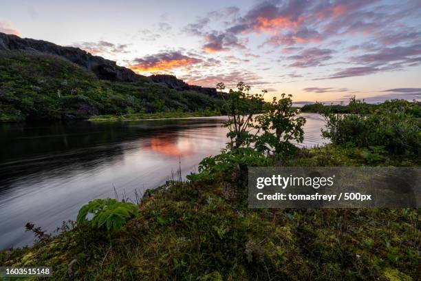 scenic view of lake against sky during sunset - landslag imagens e fotografias de stock