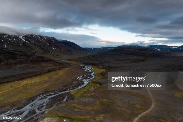 scenic view of landscape against sky - landslag stock pictures, royalty-free photos & images