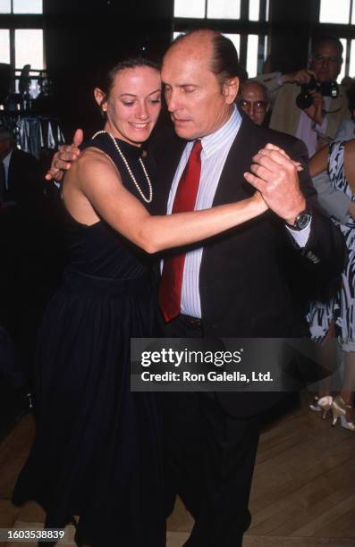 Actor couple Sharon Brophy and Robert Duvall attend the Ballroom Week Kick-Off celebration gala at the Rainbow Room, New York, New York, May 31, 1990.