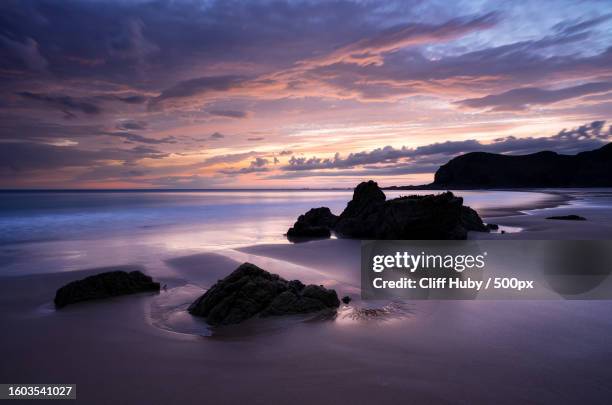 scenic view of sea against sky during sunset,channel islands,jersey - jersey channel islands stock-fotos und bilder