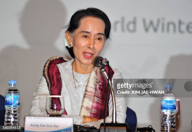 Aung San Suu Kyi , Myanmar's opposition leader, speaks during a press conference of The Global Development Summit, held on the sidelines of the 10th...