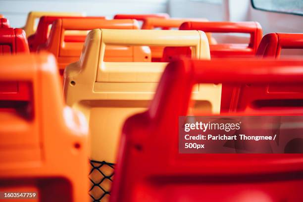 close-up of red seats - passenger craft stockfoto's en -beelden