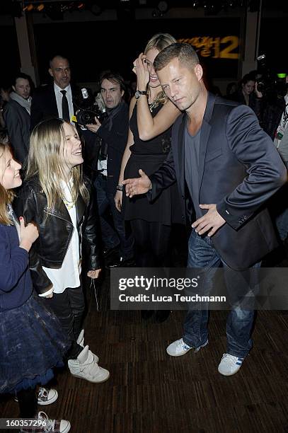 Svenja Holtmann, Til Schweiger dances with his daughter Emma and Paula at the after show party to 'Kokowaeaeh 2' - Germany Premiere at Astra on...