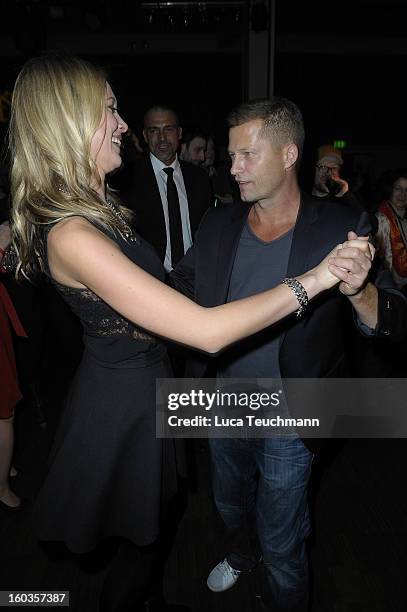 Til Schweiger dances with Svenja Holtmann at the after show party to 'Kokowaeaeh 2' - Germany Premiere at Astra on January 29, 2013 in Berlin,...