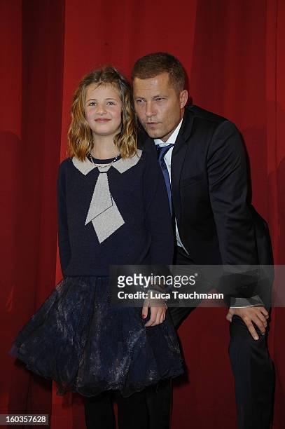 Emma Schweiger and Til Schweiger attends 'Kokowaeaeh 2' Germany Premiere at Cinestar Potsdamer Platz on January 29, 2013 in Berlin, Germany.