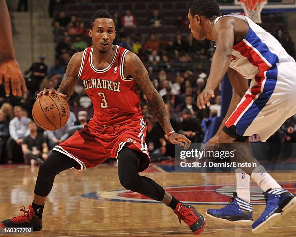 Brandon Jennings of the Milwaukee Bucks dribbles and cuts to the hoop against the Detroit Pistons during the game on January 29, 2013 at The Palace...