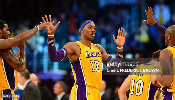 Dwight Howard of the Los Angeles Lakers and teammates celebrate their 111-106 victory over the New Orleans Hornets January 29, 2013 at Staples Center...