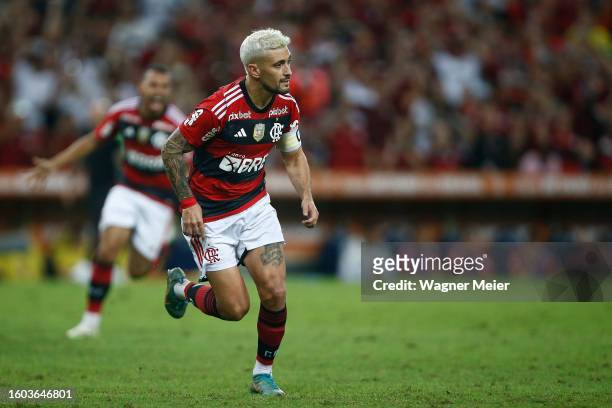 Giorgian de Arrascaeta of Flamengo celebrates after scoring the team´s first goal during a semifinal second leg match between Flamengo and Gremio as...