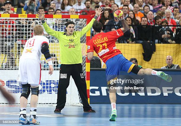 Joan Canellas of Spain tries to score a penalty to Jannick Green, goalkeeper of Denmark during the Men's Handball World Championship 2013 final match...