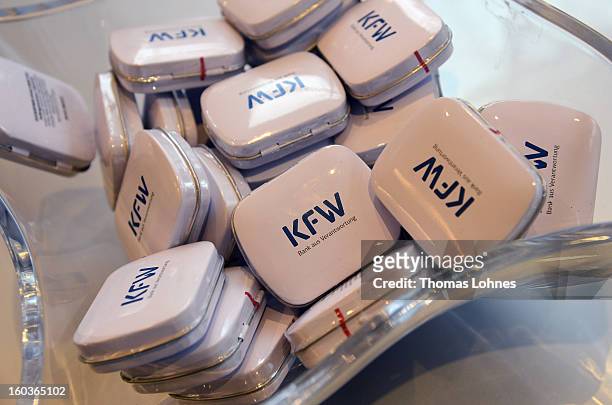 Tins are seen on a table in the headquaters of the KfW Bankengruppe, the Kreditanstalt fuer Wiederaufbau, or Reconstruction Credit Institute,...