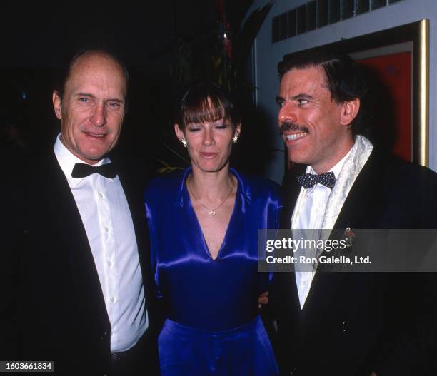 Actor couple Robert Duvall & Sharon Brophy and artist Peter Max attend a screening party for 'Full Moon in Blue Water' at Peter Max Studio, New York,...