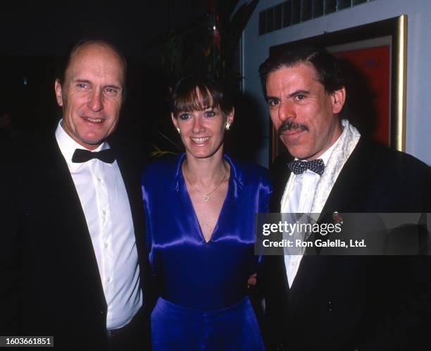 Actor couple Robert Duvall & Sharon Brophy and artist Peter Max attend a screening party for 'Full Moon in Blue Water' at Peter Max Studio, New York,...