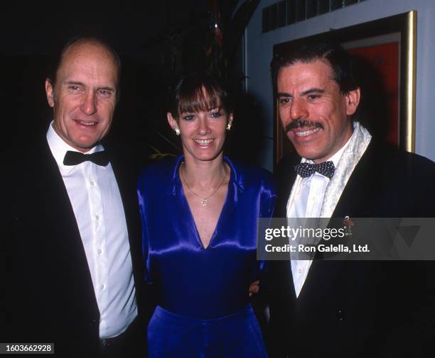 Actor couple Robert Duvall & Sharon Brophy and artist Peter Max attend a screening party for 'Full Moon in Blue Water' at Peter Max Studio, New York,...