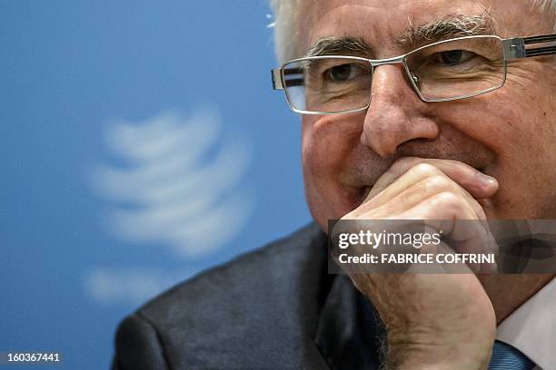 New Zealand's trade minister Tim Groser looks on during a press conference following a hearing on January 30, 2013 at the World Trade Organization...