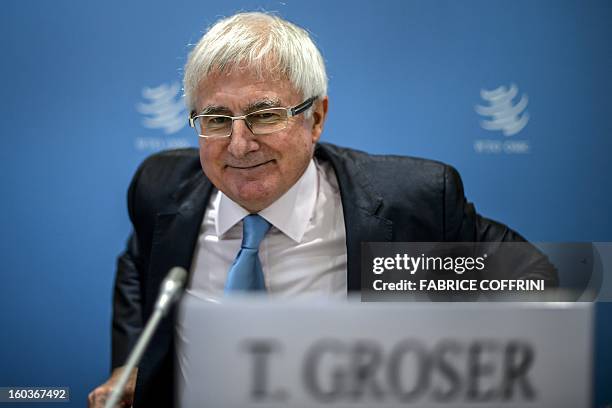 New Zealand's trade minister Tim Groser looks on during a press conference following a hearing on January 30, 2013 at the World Trade Organization...