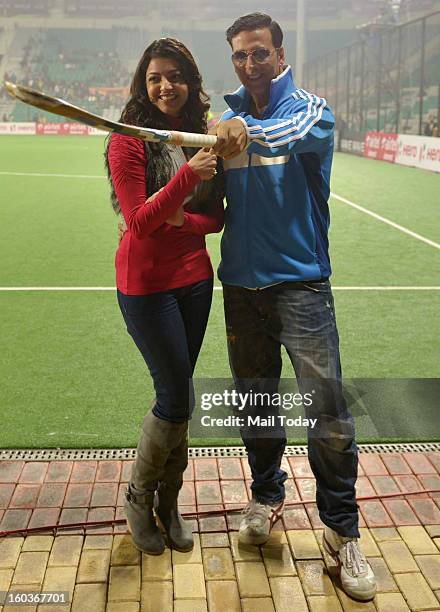 Actor Akshay Kumar and actress Kajal Aggarwal during the HIL match between Delhi Waveriders vs Punjab Warriors at MDC National stadium in New Delhi...