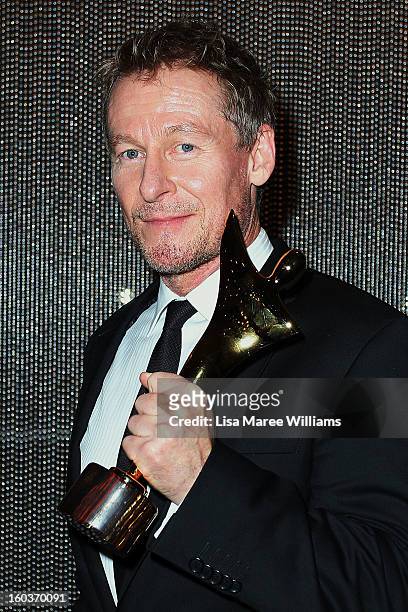 Richard Roxburgh celebrates his award for Best Lead Actor in a Television Drama for 'Rake' at the 2nd Annual AACTA Awards at The Star on January 30,...