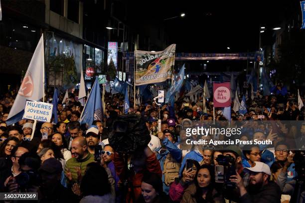 Supporters of Luisa Gonzalez presidential candidate for Revolucion Ciudadana coalition shout slogans during a campaign closing rally on August 16,...