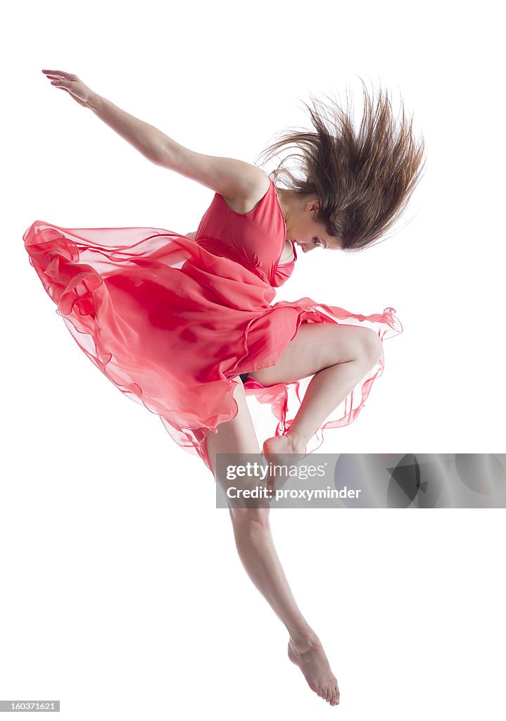 The dancer in midair isolated on white