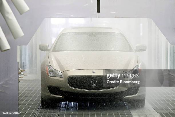 Maserati Quattroporte luxury automobile undergoes a water test during production at Fiat SpA's Grugliasco factory in Turin, Italy, on Wednesday, Jan....