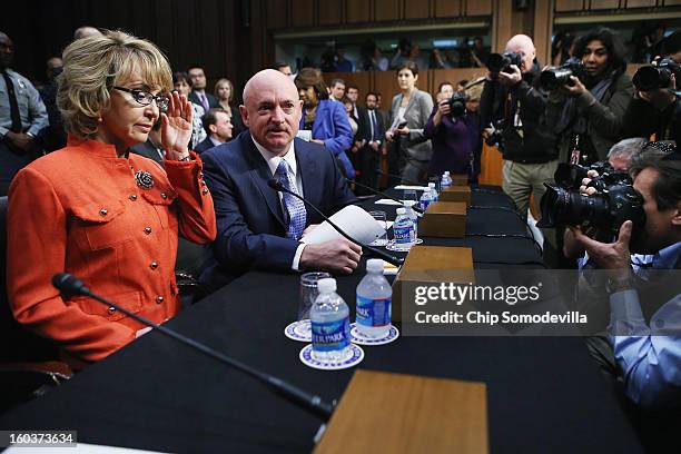 Shooting victim and former U.S. Rep. Gabby Giffords and her husband Retired NASA astronaut and Navy Capt. Mark Kelly arrive for a Senate Judiciary...