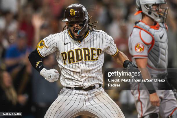 Fernando Tatis Jr. #23 of the San Diego Padres celebrates after stealing home plate in the seventh inning against the Baltimore Orioles at Petco Park...