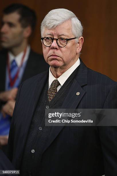 National Rifle Association President David Keene arrives before a Senate Judiciary Committee hearing about gun control on Capitol Hill January 30,...