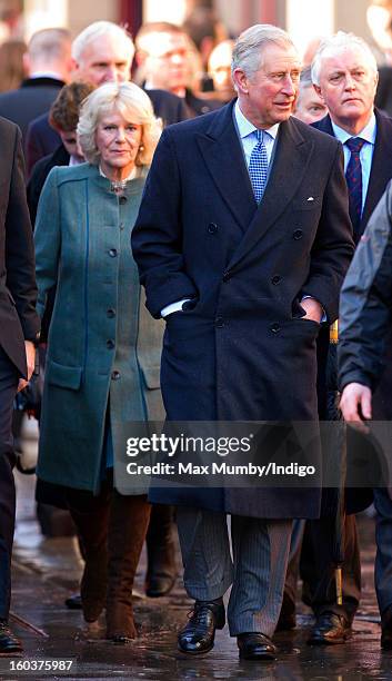 Camilla, Duchess of Cornwall and Prince Charles, Prince of Wales walk to Farringdon Underground Station, after viewing the nearby Crossrail...