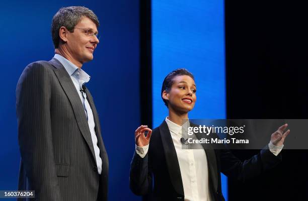 BlackBerry President and Chief Executive Officer Thorsten Heins stands with new BlackBerry Global Creative Director Alicia Keys at the BlackBerry 10...