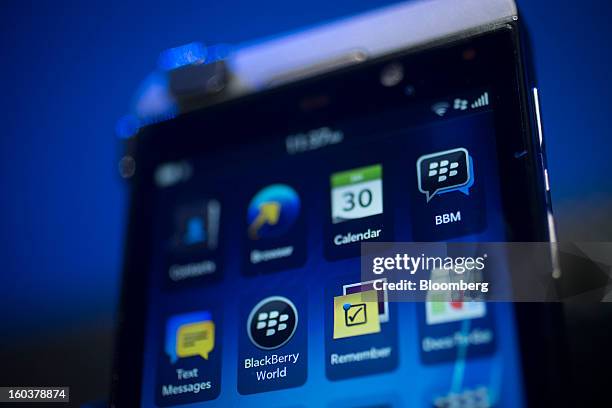 The new BlackBerry 10 is displayed during the device's launch in New York, U.S., on Wednesday, Jan. 30, 2013. Research In Motion Ltd. , taking the...