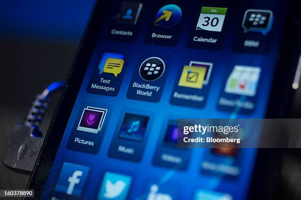 The new BlackBerry 10 is displayed during the device's launch in New York, U.S., on Wednesday, Jan. 30, 2013. Research In Motion Ltd. , taking the...