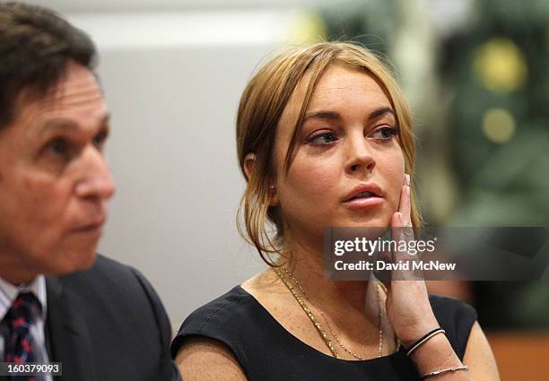 Troubled actress Lindsay Lohan appears in court for a pretrial hearing with her new lawyer Mark Heller before Judge Stephanie Sautner at the Airport...