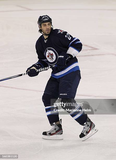 Chris Thorburn of the Winnipeg Jets skates down the ice during a game against the Pittsburgh Penguins on January 25, 2013 at the MTS Centre in...