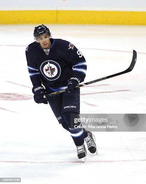 Evander Kane of the Winnipeg Jets keeps his eyes on the play in a game against the Pittsburgh Penguins on January 25, 2013 at the MTS Centre in...