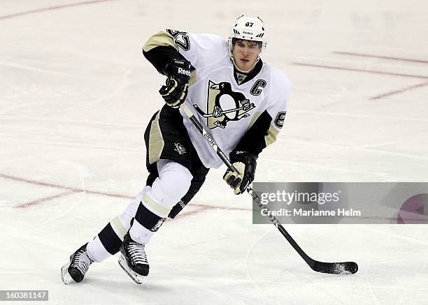 Sidney Crosby of the Pittsburgh Penguins skates down the ice during a game against the Winnipeg Jets on January 25, 2013 at the MTS Centre in...