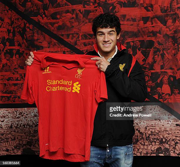 Philippe Coutinho poses with the club shirt after signing for Liverpool FC on January 30, 2013 in Liverpool, England.