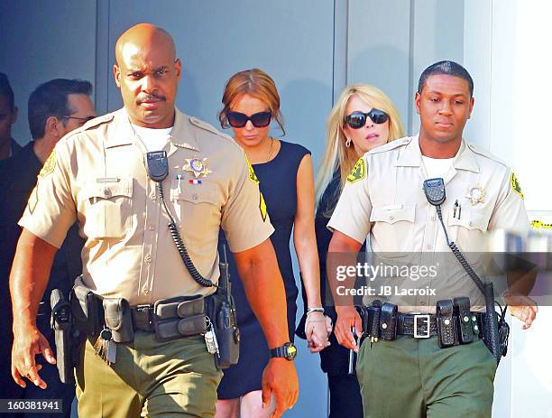 Lindsay Lohan and Dina Lohan are seen leaving the LAX Courthouse on January 30, 2013 in Los Angeles, California.