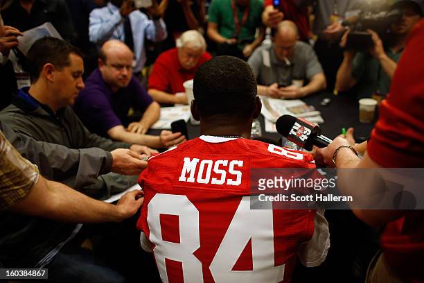 Randy Moss of the San Francisco 49ers addresses the media during Super Bowl XLVII Media Availability at the New Orleans Marriott on January 30, 2013...