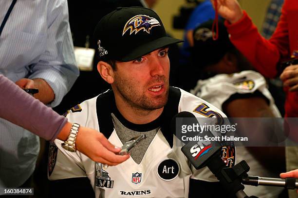 Joe Flacco of the Baltimore Ravens addresses the media during Super Bowl XLVII Media Availability at the Hilton New Orleans Riverside on January 30,...