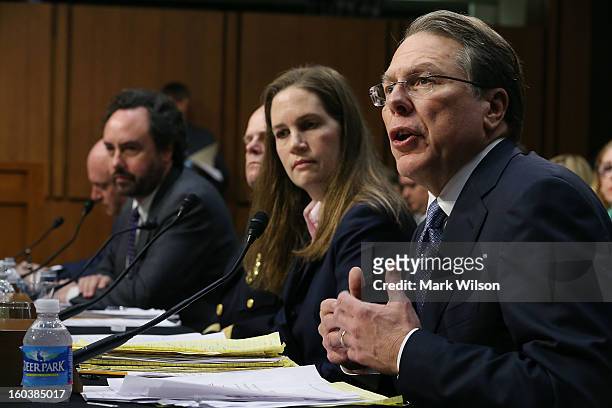Wayne LaPierre Executive Vice President and Chief Executive Officer National Rifle Association testifies while flanked by ,Capt. Mark Kelly, USN Ret,...