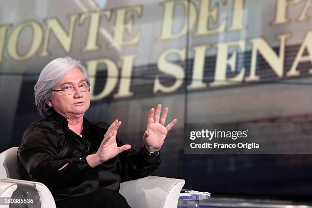 Centre-left candidate of Democratic Party Rosy Bindi attends 'Porta A Porta' Tv show while an image regarding Monte dei Paschi di Siena bank is...