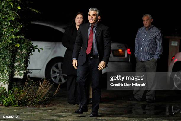 Israeli politician Yair Lapid leader of the Yesh Atid party arrives for a meeting with President Shimon Peres at the presidential compound on January...