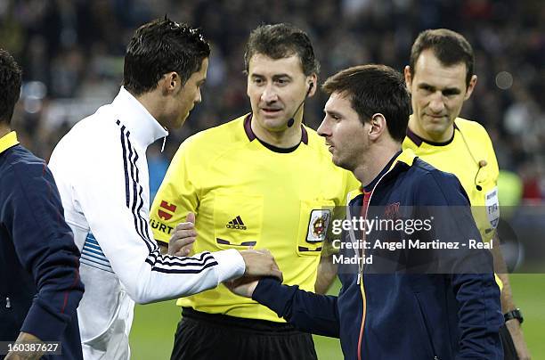 Cristiano Ronaldo of Real Madrid shakes hands with Lionel Messi of Barcelona before the Copa del Rey Semi-Final first leg match between Real Madrid...