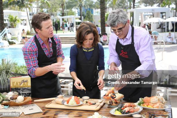 Billy Bush, Catherine 'Kit' Hoover and Steve Sawitz attend Access Hollywood cabana at NAPTE 2013 at Fontainebleau Miami Beach on January 30, 2013 in...