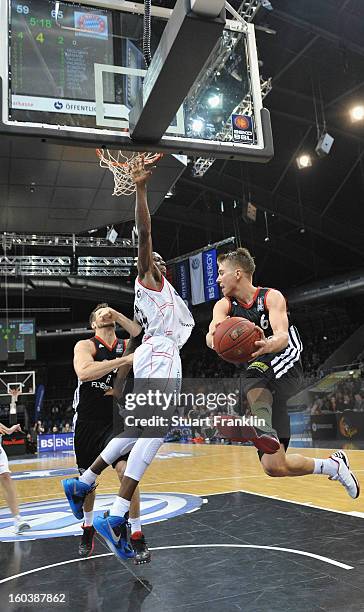 Eric Boateng of Braunschweig challenges Steffen Hamann of Muenchen during the BBL match between New Yorker Phantoms Braunschweig and FC Bayern...